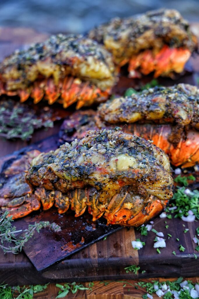Discover the Secret to Smoky, Succulent Lobster Tails with Live Fire Republic's Wood Plank-Smoked Spiny Lobster Tails!