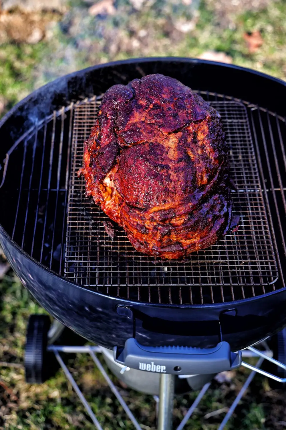 Double-smoked Easter Ham with a caramelized Blueberry-Bourbon Glaze all prepared over live fire.