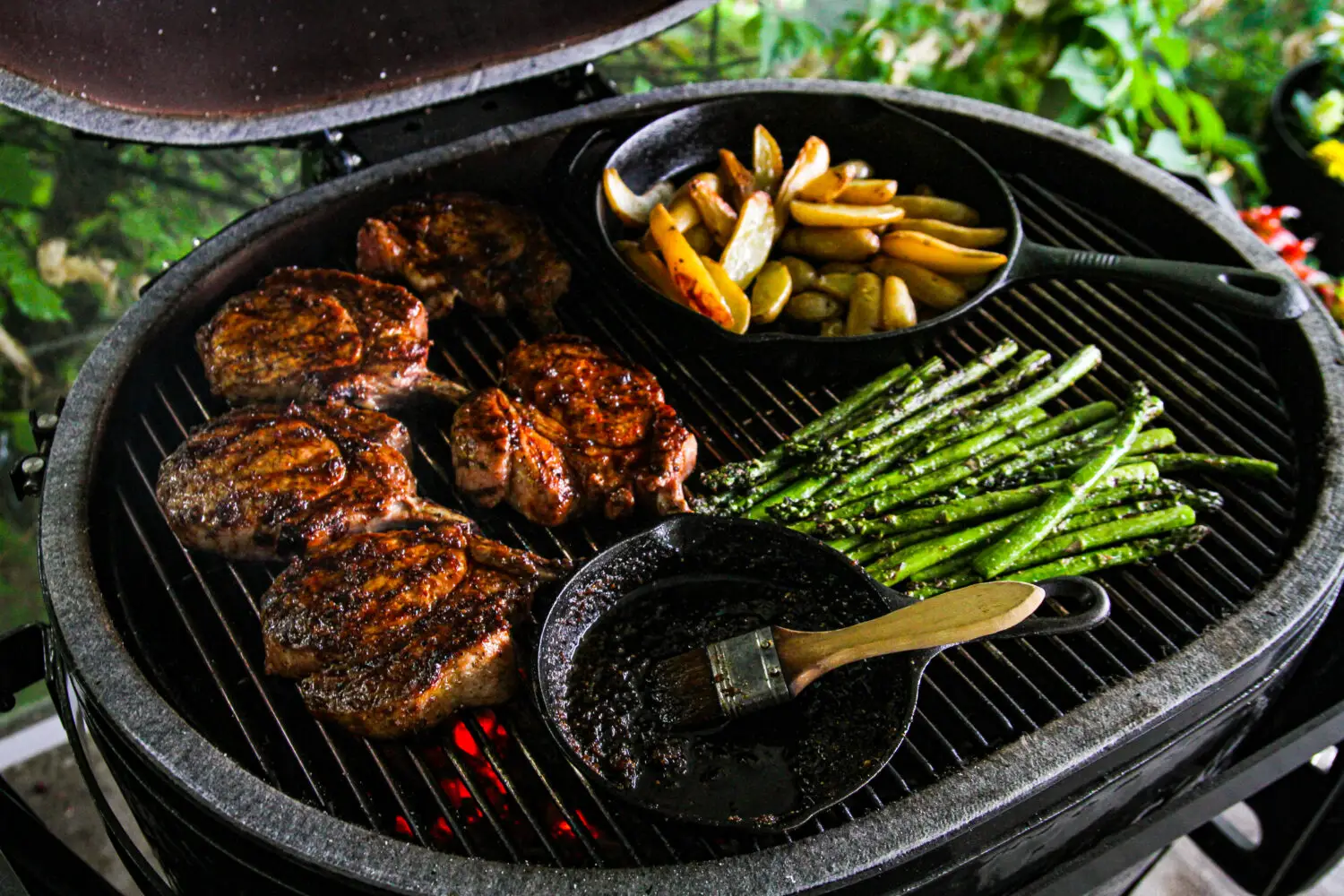 pork chops, asparagus, potatoes, glaze on grill