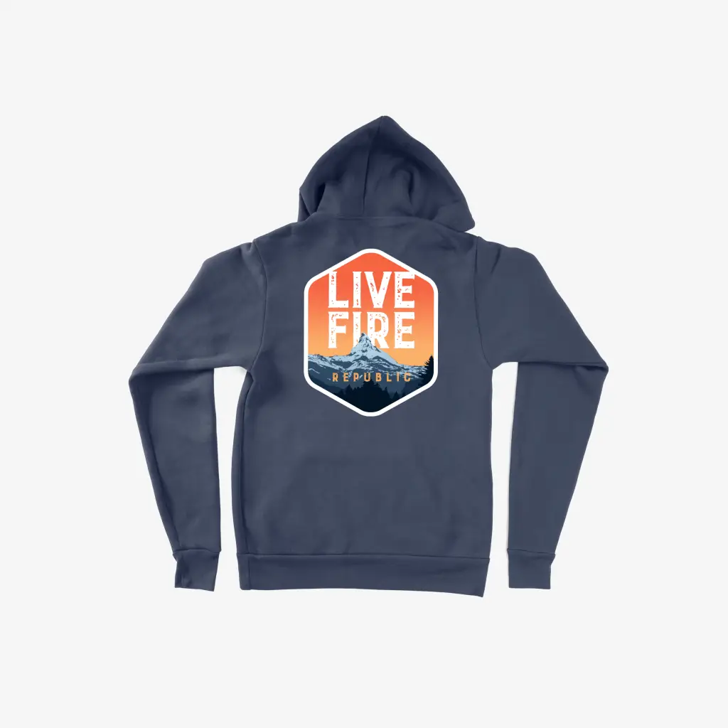 Navy hoodie with Live Fire Republic graphic and mountain scenery on the back. Perfect for outdoor enthusiasts.