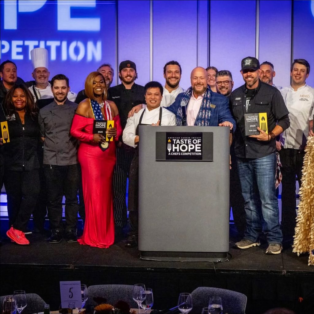 Chefs and guests pose at Taste of Hope event