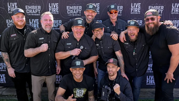 Distorted group photo of men at Live Fire Republic backdrop